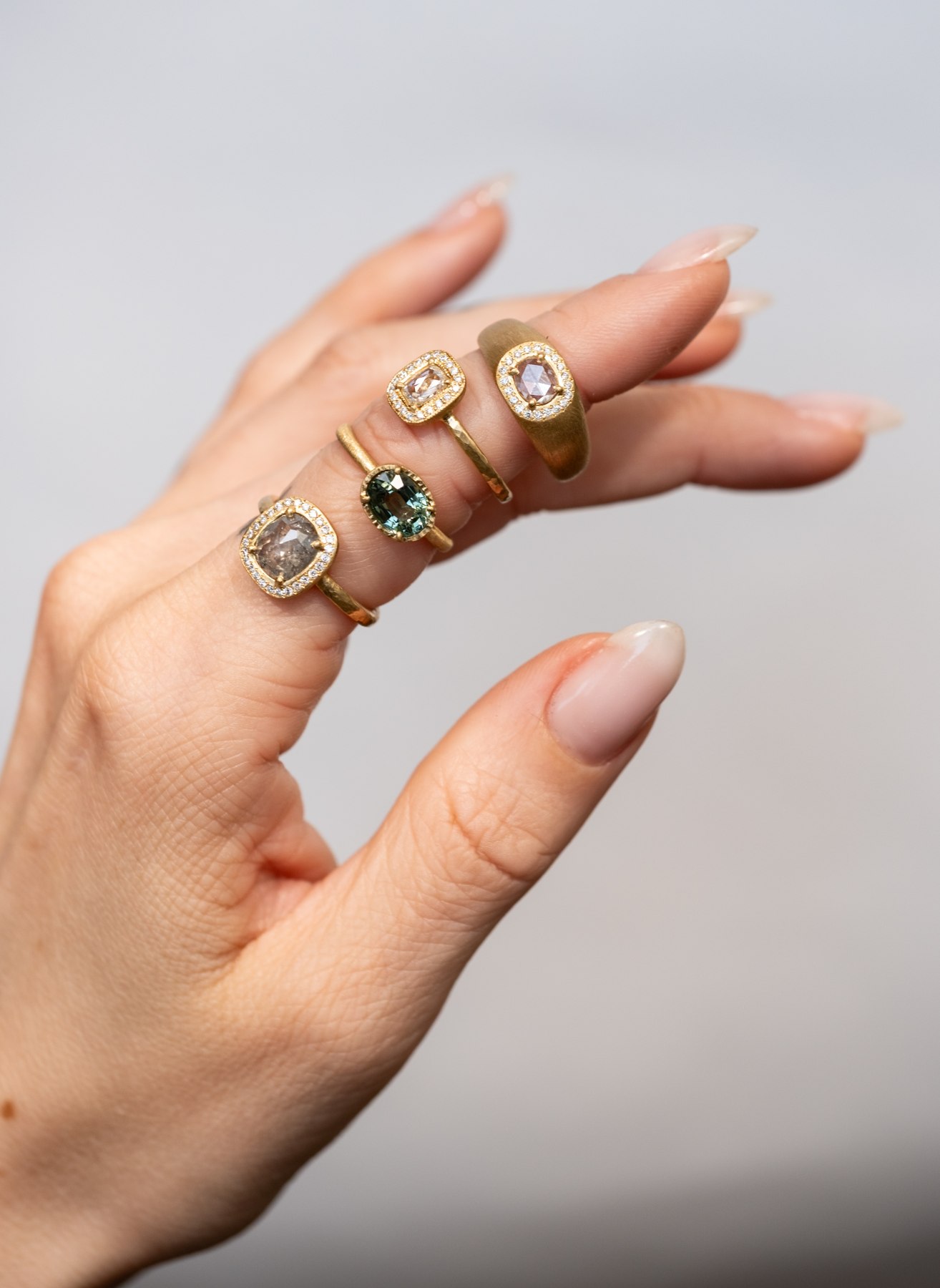 Hand modeling gold and gemstone rings